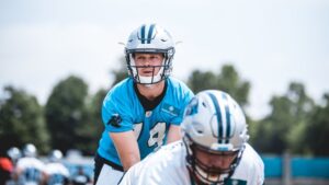 Sam Darnold taking snaps during OTAs